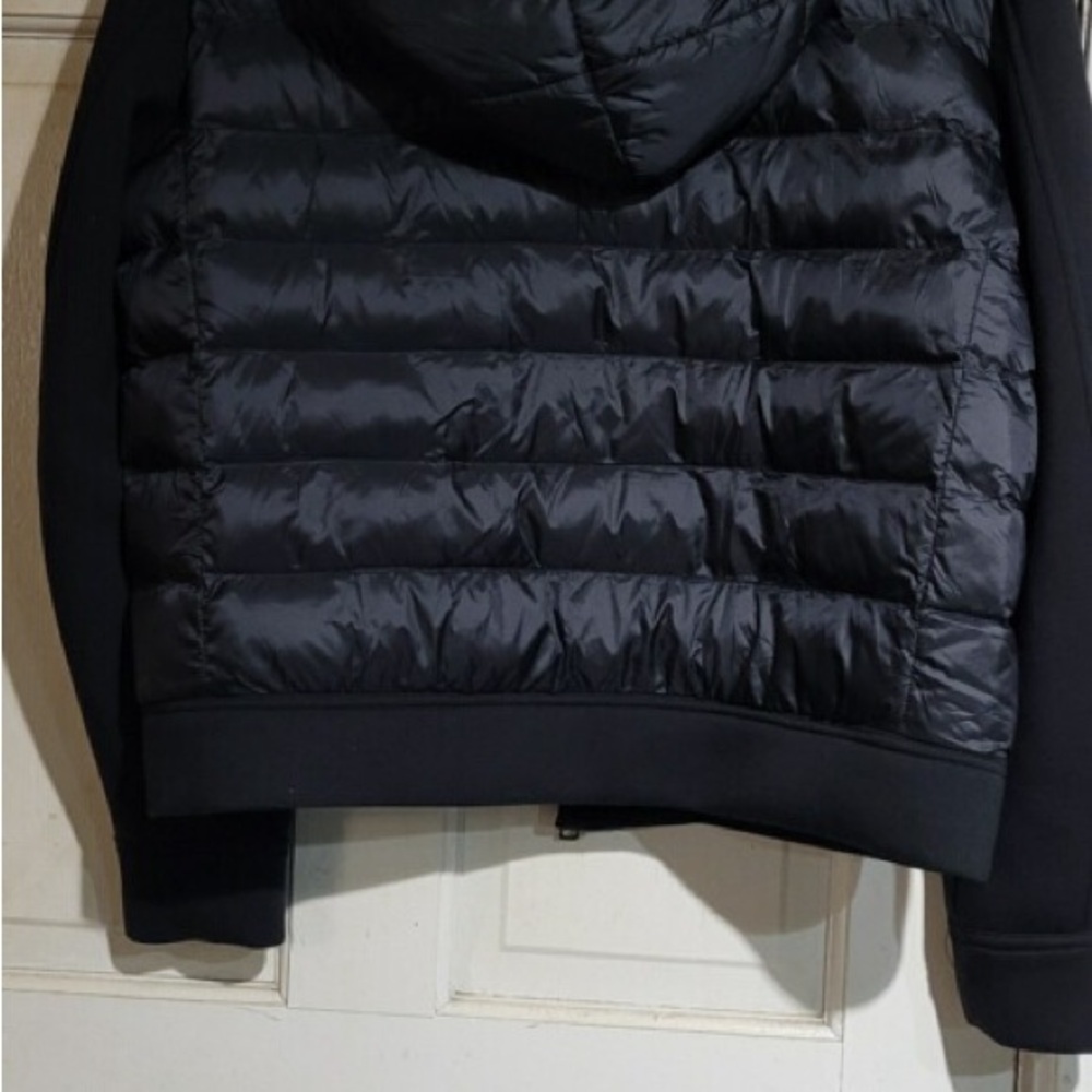 Tumi Black Jacket with Red Logo